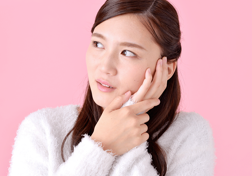 親知らずが痛む女性